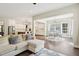 Open-concept living area showcasing a seamless transition to the kitchen and dining spaces at 421 Gilpin Way, Cary, NC 27519