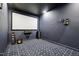 Finished basement theater room with large screen, speakers, and navy blue carpet at 421 Gilpin Way, Cary, NC 27519