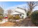 Traditional home with mature trees, shrubs, and a well maintained yard at 507 Price Ave, Durham, NC 27701