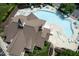 High aerial view showcasing the community's clubhouse, large pool, and surrounding amenities at 5113 Lady Of The Lake Dr, Raleigh, NC 27612