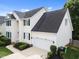Stylish two-story home showcasing a two-car garage and manicured landscaping at 5942 Big Nance Dr, Raleigh, NC 27616