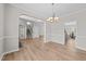 Spacious living area showcasing an open floor plan and modern finishes at 5942 Big Nance Dr, Raleigh, NC 27616
