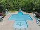 Aerial view of a community swimming pool with lounge chairs and a splash pool at 5942 Big Nance Dr, Raleigh, NC 27616