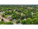 An aerial view showing the neighborhood, surrounding lush greenery and nearby homes at 601 Acorn St, Burlington, NC 27215