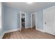 Bedroom with doorways that lead to other areas of the house at 601 Acorn St, Burlington, NC 27215
