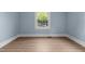 Bedroom with large window providing ample natural light at 601 Acorn St, Burlington, NC 27215