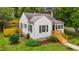 Well-maintained home showcasing a tidy yard, refreshed paint, and classic architectural details at 601 Acorn St, Burlington, NC 27215