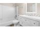 Clean bathroom features a shower-tub and a vanity with ample storage at 6104 New Market Way, Raleigh, NC 27609