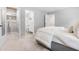 Bright main bedroom with an ensuite bathroom and walk-in closet with custom shelving at 6104 New Market Way, Raleigh, NC 27609