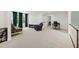 Bonus room with neutral carpeting and versatile layout, creating a comfortable and inviting space at 7009 Brecken Ridge Ave, Raleigh, NC 27615