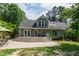 Charming two-story home with large deck and patio perfect for entertaining at 7009 Brecken Ridge Ave, Raleigh, NC 27615