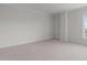 Cozy bedroom with plush carpet, neutral walls, closet space, and plenty of room to relax and unwind at 710 Independence Pl # 301, Raleigh, NC 27603