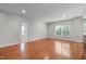 Bright and airy bedroom with hardwood floors, large windows, neutral paint, and ample natural light at 710 Independence Pl # 301, Raleigh, NC 27603
