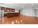 Spacious living area with hardwood floors, kitchen features, and plenty of open space and natural light at 710 Independence Pl # 301, Raleigh, NC 27603