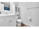 Clean bathroom with white fixtures, a vanity, and a shower-tub combination at 7365 Sandy Creek Dr, Raleigh, NC 27615