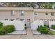 Charming townhouse with white picket fence and well-maintained landscaping at 7365 Sandy Creek Dr, Raleigh, NC 27615