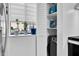 Bright laundry area with modern washer and dryer and a window with lots of natural light at 7365 Sandy Creek Dr, Raleigh, NC 27615