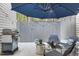 Outdoor patio area with furniture, grill, and umbrella, perfect for entertaining guests at 7365 Sandy Creek Dr, Raleigh, NC 27615