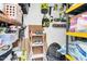 A well-organized storage area equipped with shelves, pegboards, and assorted tools at 7365 Sandy Creek Dr, Raleigh, NC 27615