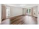 Spacious bedroom with hardwood floors and abundant natural light at 8116 Bentwood Pl, Raleigh, NC 27615