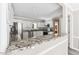 Open kitchen featuring granite counters, stainless appliances, and a breakfast bar at 8116 Bentwood Pl, Raleigh, NC 27615