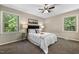 A well-lit bedroom has neutral tones and soft decor at 821 Stoneybrook Dr, Sanford, NC 27330