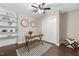 This charming office features a wooden desk, decorative rug and globe, providing a cozy workspace at 821 Stoneybrook Dr, Sanford, NC 27330