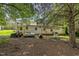 Spacious backyard featuring mature trees and natural landscaping at 8635 Old Us 421 S, Bear Creek, NC 27207