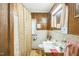 Bathroom featuring light fixtures, sink, and toilet at 8635 Old Us 421 S, Bear Creek, NC 27207