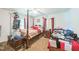 Bedroom featuring natural light, wood paneling, and ceiling fan at 8635 Old Us 421 S, Bear Creek, NC 27207