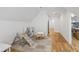 Bonus room area with a toy kitchen, and climbing structure on hardwood floors at 911 Canterbury Rd, Raleigh, NC 27607