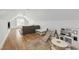 Spacious bonus room with hardwood floors, built-in shelving, and ample space for play and relaxation at 911 Canterbury Rd, Raleigh, NC 27607