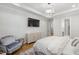 Serene primary bedroom showcasing a comfortable bed, soft lighting, and a calming atmosphere for rest and relaxation at 911 Canterbury Rd, Raleigh, NC 27607