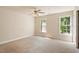 Bedroom showcasing a ceiling fan, two windows, neutral walls and closet at 9112 Mission Hills Ct, Raleigh, NC 27617
