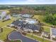 Aerial view of community center with pool, clubhouse, and tennis courts at 1010 Sandbar Ln, Durham, NC 27703
