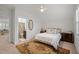 Spacious bedroom with ensuite bathroom access and traditional decor at 1010 Sandbar Ln, Durham, NC 27703