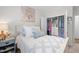 Bright bedroom boasts an organized closet with ample storage space and a calming decor at 1010 Sandbar Ln, Durham, NC 27703