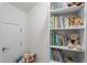Functional hallway with built-in shelving ideal for books, toys and general storage at 1010 Sandbar Ln, Durham, NC 27703
