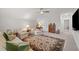 Cozy living room features comfortable seating, a decorative rug, and a relaxing ambiance at 1010 Sandbar Ln, Durham, NC 27703