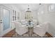 Cozy sitting room with comfortable seating and natural light at 1010 Sandbar Ln, Durham, NC 27703