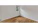 Bright bedroom with hardwood floors and a window providing natural light at 103 Kylie Savannah Ct, Cary, NC 27511