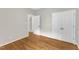 Bedroom showcasing hardwood floors, and white doors at 103 Kylie Savannah Ct, Cary, NC 27511