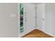 Bright foyer with hardwood floors and a view to the outside at 103 Kylie Savannah Ct, Cary, NC 27511