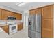 Bright kitchen with modern appliances, oak cabinets, and an efficient layout for easy cooking and entertaining at 103 Kylie Savannah Ct, Cary, NC 27511
