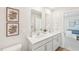 Elegant bathroom with double vanity sinks and modern fixtures at 1037 Winding Spring Dr, Mebane, NC 27302