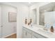 Modern bathroom with double sinks, white cabinets, and a separate toilet room and shower at 1037 Winding Spring Dr, Mebane, NC 27302