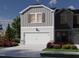 Charming two-story townhouse with a garage and beautifully landscaped front yard at 1037 Winding Spring Dr, Mebane, NC 27302
