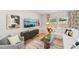 Inviting living room with stylish decor, comfortable seating, and a large screen television at 1037 Winding Spring Dr, Mebane, NC 27302