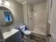 Bathroom with shower, vanity, toilet, and modern fixtures at 108 W Marsha Gayle Ct, Fuquay Varina, NC 27526