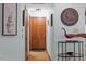 Hallway with neutral decor and a mix of artwork at 109 Loch Haven Ln, Cary, NC 27518